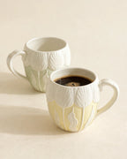Sage and butter Tulip Morning Mugs, true squat shape with matte finish